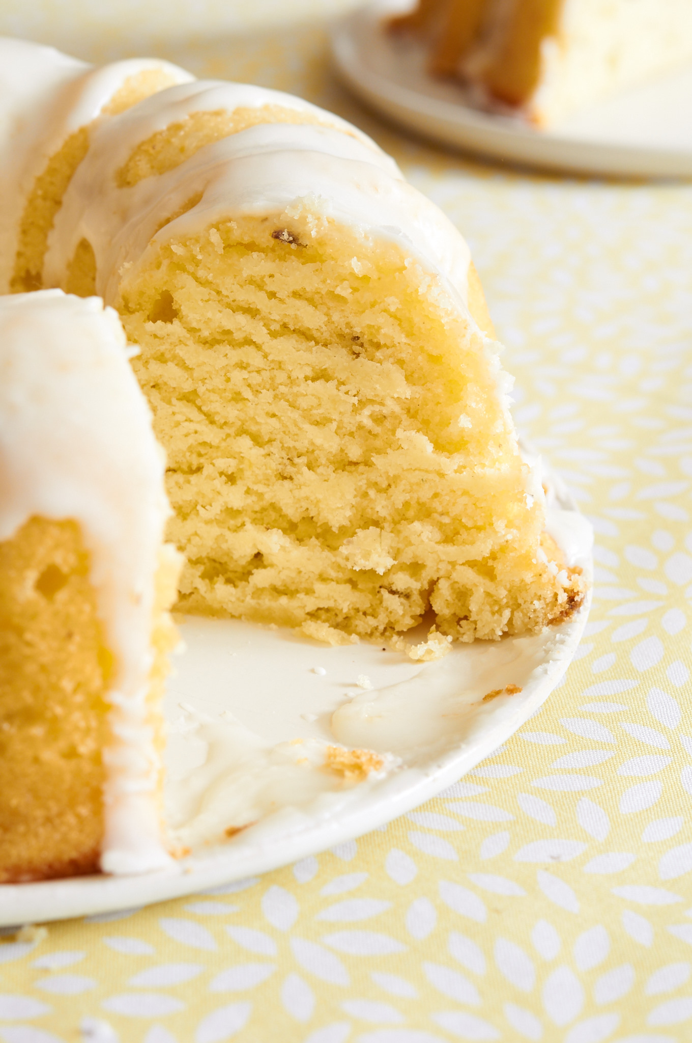 This Lemon Lavender Bundt Cake is light, moist and very refreshing. The perfect spring time dessert. | ibakeheshoots.com